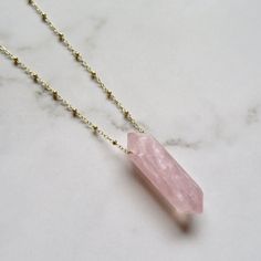 Long Rose Quartz Necklace~  Beautiful pink rose quartz pendant on long 14k gold fill satellite chain. Chain is approx. 30" Crystal approx. 1.5" X .5" *models wearing similar designs SHOP~ https://www.etsy.com/shop/HanaMauiCreations?ref=si_shop International buyers please read our shipping policies before ordering~ POLICIES~ https://www.etsy.com/shop/HanaMauiCreations/policy?ref=shopinfo_policies_leftnav Delicate Pink Rose Quartz Crystal Necklace, Rose Gold Crystal Necklaces With Rose Quartz Gemstone, Pink Crystal Necklaces With Adjustable Chain For Gift, Pink Crystal Necklaces With Adjustable Chain As A Gift, Pink Crystal Necklace With Adjustable Chain As Gift, Pink Faceted Crystal Necklace For Gift, Rose Quartz Faceted Necklace For Gifts, Minimalist Pink Rose Quartz Jewelry, Pink Faceted Rose Quartz Jewelry