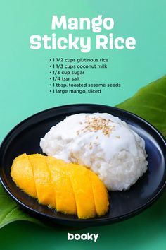 mango sticky rice is served on a black plate