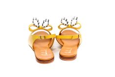 "Handmade yellow flat leather slingback sandals, embellished with double bow and easy to put they are must have pair of shoes for every summer yet to come. They will simply add a kick to any summer outfit you choose. Wedding or not here they come. The cushioned insole will make them only inseparable part of everyday choice. They're designed to look stylish enough to take you \"from day to night. Full leather outer, interior and sole. DETAILS: Full leather upper, lining and sole Pink napa leather Yellow Slingback Sandals With Removable Insole, Summer Party Slingback Flats, Elegant Yellow Sandals For Summer, Closed Toe Sandals With Bow For Summer, Spring Beach Sandals With Bow Straps, Flat Party Sandals With Bow, Summer Flats With Bow, Elegant Yellow Sandals With Round Toe, Flat Sandals With Bow For Summer