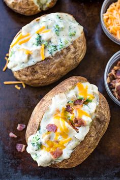 baked potatoes with broccoli, cheese and other toppings