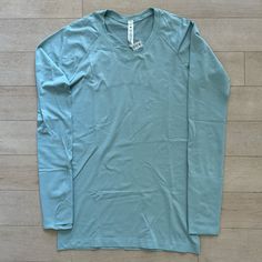 - Lululemon Swiftly Tech Long Sleeve 2.0 - Color: Hazy Jade (Hzja) - Light Blue, Teal - Silverescent Technology - Size 8 - Slim Fit, Hip Length - Thumb Holes - Seamless Fabric Minimizes Chafing - Mesh In Back For Extra Breathability - Motivational Words On Inside Of Hem: “Movement Is Medicine,” “Breathe. Repeat.” - New Without Tag, Nwot, Never Worn, No Flaws. Bought Too Many Of This Style And Never Wore This One. - 54% Nylon, 40% Recycled Polyester, 3% Elastane, 3% X-Static Nylon - Also Selling Light Blue Long Sleeve Athleisure Activewear, Movement Is Medicine, Lululemon Long Sleeve Shirts, Anna Claire, Lululemon Swiftly Tech Long Sleeve, Swiftly Tech Long Sleeve, Lululemon Long Sleeve, Lululemon Swiftly Tech, Lululemon Swiftly