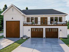 a two story house with three garages on the first floor