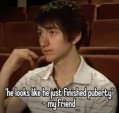 a young man sitting in an auditorium with the caption he looks like he just finished pubbing my friend