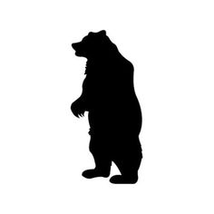 a black and white silhouette of a bear standing upright on its hind legs, looking up at the sky