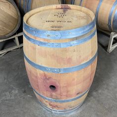 several wooden barrels stacked on top of each other