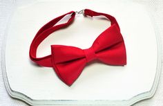 "Please visit our \"Christmas shop\" https://www.etsy.com/shop/ElenaAndChris?ref=seller-platform-mcnav&section_id=22594503 **About this bow tie This bow tie is handcrafted by me and made with 100% cotton fabric. Pre-tied, double layered and have interfacing fuzzed inside to strengthen it. Self-tie version is available too. <> ** Bow tie style - Bar pin (For babies only) - CLIP-ON (strapless) - Adjustable VELCRO strap - Adjustable strap with METAL HOOK, EYE ADJUSTER HARDWARE **Bow tie S Dog Groomsman, Bow Tie For Men, Groomsmen Bowtie, Baby Bowtie, Red Bow Tie, Tie For Men, Boys Bow Ties, Girl Dog, Bow Tie Wedding