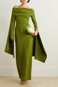 Solace London's 'Arden' dress has a draped off-the-shoulder neckline and waterfall-effect sleeves that create plenty of drama. It's cut from 'Sweet Pea' green crepe in a slim fit that creates and accentuates an hourglass silhouette. The skirt is split at the back, so you can walk a little easier in heels. Long Sleeve Dress Gala, Slim Fitted Dress, Solace London Green Dress, Green Luxury Dress, Green Elegant Outfit, Green Wedding Outfit, Green Modest Dress, Olive Dress Outfit, Green Long Sleeve Outfit