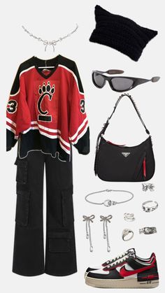 a hockey jersey, hat, sunglasses, and other items are arranged on a white surface