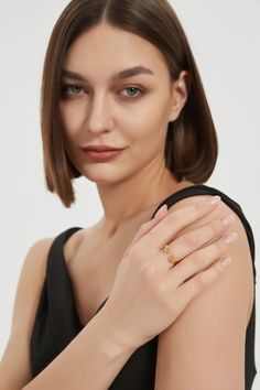 Our open ring is a unique and playful piece that showcases intricate angel and devil characters on the ends. Crafted from high-quality materials, this ring is not only stylish but also durable and long-lasting. The open design of the ring allows for easy adjustment to fit a range of sizes from 5 to 9, ensuring a comfortable and secure fit for anyone. The angel and devil characters on the ring are exquisitely detailed, adding depth and dimension to the design. This ring is the perfect choice for anyone who wants to add a touch of whimsy and personality to their everyday look. Whether you're looking for a bold statement piece or a fun accessory to wear with your favorite outfits, this ring is sure to make a lasting impression. 14k Gold Open Initial Ring, Devil Ring, Angel And Devil, Little Angel, Open Design, Ring Dainty, The Angel, Stackable Ring, Rose Gold Jewelry