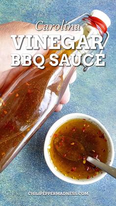 someone is pouring vinegar into a small white bowl with sauce in it and the words, carolina vinegar bbq sauce