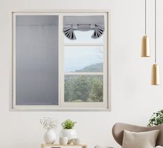 a living room filled with furniture and a window