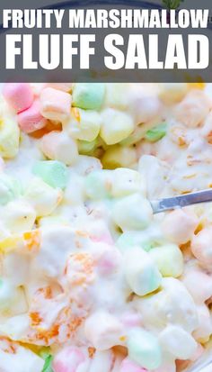 a bowl filled with fruit marshmallow fluff salad