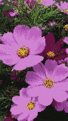 purple flowers with yellow centers are shown in this cross - stitch pattern, which is very colorful