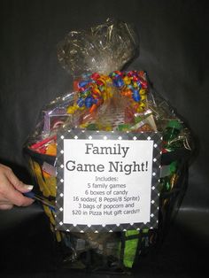 a basket filled with candy and candies for a family game night or birthday party