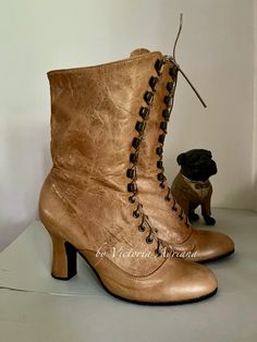 Steampunk Round Toe Boots For Fall, Steampunk Boots With Round Toe For Fall, Leather Steampunk Boots For Winter, Steampunk Leather Boots For Winter, Vintage Winter Boots In Faux Leather, Vintage Faux Leather Winter Boots, Vintage Faux Leather Boots For Fall, Steampunk Leather Moto Boots With Round Toe, Vintage Faux Leather Boots With Round Toe