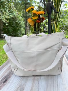 I wanted to add a bag that had a zipper and I just love the canvas cream look. 12 x 11 inches Canvas Crossbody Bucket Bag With Pockets, Crossbody Bag With Zipper Pocket For Everyday, Everyday Crossbody Bag With Zipper Pocket, Everyday Crossbody Satchel With Pockets, Everyday Crossbody Bucket Bag With Pockets, Everyday Satchel Shoulder Bag With Zipper Pocket, Everyday Shoulder Satchel With Zipper Pocket, On-the-go Canvas Backpack With Pockets, Daily Use Canvas Bag With Zipper Closure