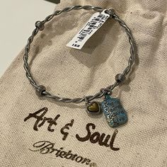 Nwt Brighton Art & Soul Bracelet. Thanks For Looking And Happy To Answer Any Questions! Adjustable Nickel-free Bracelets In Artistic Style, Adjustable Nickel-free Artistic Bracelets, Artsy Bangle Jewelry For Gifts, Artsy Bracelet Jewelry Gift, Artsy Adjustable Metal Jewelry, Brighton Bracelets, Blue Stone Necklace, Faux Pearl Bracelet, Brighton Jewelry