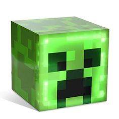 an image of a glowing green cube with a face on the front and bottom side