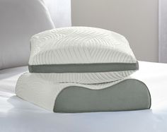 two pillows stacked on top of each other