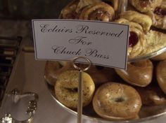 there are many donuts on display in the kitchen and sign says, cadus reserved for check - pass