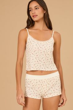 Embrace your inner flower child with this delicate floral thermal cami! The soft fabric and feminine lace trim create a dreamy, effortlessly chic look. Perfect for layering or wearing solo, this top is a must-have for your wardrobe. Skirts With Boots, Patchwork Dress, Swimwear Sale, Altar'd State, Flower Child, Trending Dresses, White Skirts, White Shop, Dress With Bow