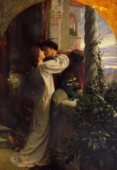 an image of a man and woman kissing in front of a painting on the wall