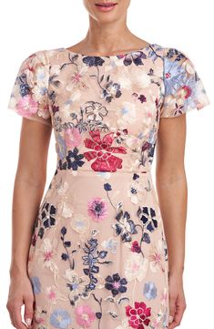 Colorful floral embroidery blossoms on the tulle overlay of this stunning short-sleeve gown that's ready for your next special occasion. 60" length Hidden back-zip closure Bateau neck Short sleeves Side slit Lined, except sleeves 100% polyester Dry clean Imported Embroidery Gown, Hourglass Body Shape, Mother Of The Bride Dresses Long, Positive Mantras, Column Skirt, Sleeve Gown, Guest Attire, Pleated Sleeves, Wedding Attire Guest