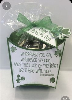 a st patrick's day card in a gift box with shamrocks on it