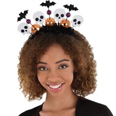 You're all-out festive this Halloween in this sparkly accessory! The fabric-covered plastic headband has so many decorations orange mirrored disco balls black glitter bats white glitter skulls and purple balls. Black foil tinsel completes the look. pbGlitter Mirror Ball Halloween Headband product details:-b-p ul li9.4in wide x 9.4in tall-li liFabric-covered band-li liFabric plastic and metal-li liDoes not include shirt-li liOne size fits most teens and adults-li -ul Glitter Mirror, 1st Birthday Balloons, Orange Mirror, Sparkly Accessories, Honeycomb Decorations, Wedding Tableware, Wedding Balloon Decorations, Birthday Bouquet, Halloween Headband