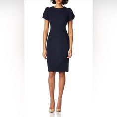 Product Details The Traditional Sheath Dress Gets A Major Makeover. Calvin Klein Modernizes The Look With Pretty Tulip Sleeves. Imported Scoop Neckline; Sheath Silhouette Back Zipper Closure Short Tulip Sleeves Unlined Calvin Klein Chic Midi Dress For Work, Cap Sleeve Dress With Flattering Silhouette For Work, Fitted Cap Sleeve Dress For Work, Blue Fitted Dress With Cap Sleeves, Elegant Fitted Calvin Klein Mini Dress, Elegant Calvin Klein Midi Dress For Office, Elegant Calvin Klein Dress For Office, Elegant Calvin Klein Office Dress, Calvin Klein Chic Midi Office Dress