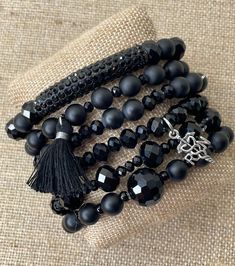 Full RN stacked bracelet set made with natural stone beads and Chinese crystals. Beaded Black Bracelets, Black Charm Bracelet, Black Crystal Bead Jewelry, Black Bracelet Aesthetic, Black Bracelet Ideas, Whisp Grant, Black Jewelry Bracelets, Fox Oc, Bead Business