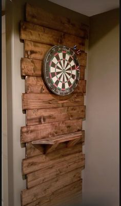 a dart board mounted to the side of a wall