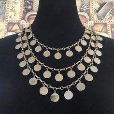 ON SALE    Striking Vintage Coin Button Style Bib Necklace, 1960's 1970's Collectible Retro Statement Runway Jewelry In very good vintage condition. Measures 19 1/2 inches total length  A very nice piece and makes a very nice statement. Don't miss out on this retro collectible piece.  Hope you can come back often as I am constantly listing new beauties! Stop by my shop to take a peek at a lot  more vintage jewelry & collectibles.... www.etsy.com/shop/martinimermaid #vintage #coin #bib #necklace Runway Jewelry, Button Style, Gem Necklace, Vintage Vogue, Multi Strand Necklace, Bib Necklace, Strand Necklace, Jewelry Lover, Multi Strand