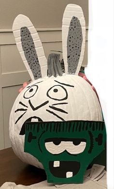 a paper mache with a bunny mask on it