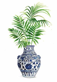 a blue and white vase with a plant in it