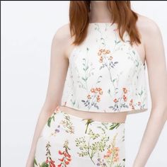 Zara Delicate Floral Off White Halter Spaghetti Strap Crop Top Size Xs Cross-Over Opening On The Back Condition: New Without Tags Approximate Measurements (Flat Lay): Pit To Pit: 15" Length: 16.5" White Spring Party Camisole, White Camisole For Spring Party, Summer Floral Print Cropped Top, Spring Floral Print Cropped Crop Top, Summer Floral Print Cropped Crop Top, Chic Floral Print Crop Top For Spring, Chic Floral Print Crop Top For Brunch, Cropped Camisole For Summer, Spring Party Camisole