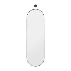 an oval shaped mirror on a white background with clippings to the right and left sides