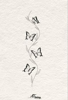 some butterflies flying in the air on top of a white piece of paper with black ink