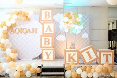 a baby shower party with balloons and decorations