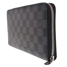 Introducing the Louis Vuitton Zippy Organizer Nm Bifold Wallet in Damier Graphite Black. This exquisite bifold wallet is 100% d , as all our items are carefully selected and ated by our team of experts. With over 8 years of experience, Jebwa is a top luxury reseller on Poshmark, having sold over 16K items and garnered thousands of happy customers. Shop with confidence knowing you are getting a genuine product.Please note that this wallet may show signs of use and flaws from normal wear and tear. Canvas Organizer, Travel Documents, Canvas Wallet, Wallet Organization, Bifold Wallet, Cartier Ring, Modern Life, Botswana, Black Canvas