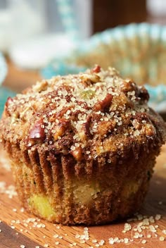 a close up of a muffin on a wooden table