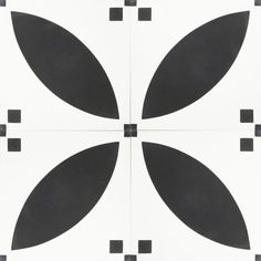 a black and white tile design with four square shapes in the center, on top of each other