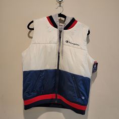 Champion Down Puffer Vest With Grey Layering Hood Red White And Blue Patriotic Jacket Vest Layering Piece Athletics Nwt Stadium Puffer Vest J4380 549707 7+N Chalk White White Winter Streetwear Vest, White Vest For Streetwear In Fall, White Fall Streetwear Vest, Sporty White Vest For Streetwear, White Outdoor Vest For Fall, White Winter Vest For Cold Weather, Vest Layering, Champion Jacket, Jacket Vest