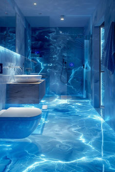 a bathroom that has blue water on the floor and walls, with a tub in the middle