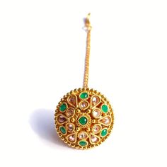 Name Of Product:- Antique Borla (Indian Fashion Jewelry) Width: 3 centimeter Shipping Processing Time: 1-3 days Delivery Time: Depend on Country High-quality Borla style Kundan tika. The tika is Rajasthani style Borla. Ideal for wedding, mehndi ceremony. Absolutely stunning. Finished off beautifully by adding Polk. To view our latest collection of Borla, Mang Tikka, and Hair Accessories please click the below link. https://www.etsy.com/uk/shop/HemrajJewellers?ref=seller-platform-mcnav&sectio Traditional Green Round Jewelry, Bohemian Gold Tikka As Gift, Bohemian Gold Tikka For Gift, Green Jewelry With Motifs For Gift, Green Tilla Tikka For Ceremonial Occasion, Gift Tikka With Intricate Design, Festive Green Jewelry With Motifs, Handmade Gold Tikka As Gift, Round Meenakari Tikka As Gift