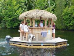 two people and a dog sitting on a boat in the water with caption that reads, if i could just spend the rest of summer here, that'd be great