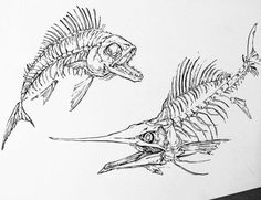 two fish that are next to each other on a white paper sheet with black ink