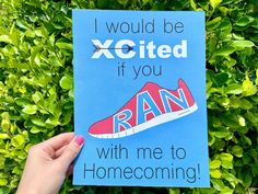 someone is holding up a card that says i would be excited if you ran with me to home coming