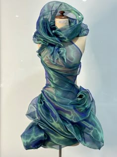 Metalic draped gown by John Azzi Deep Sea Inspired Fashion, Aquatic Fashion Inspiration, Peacock Fashion Design, Water Inspired Clothes, Water Fashion Design, Air Element Outfit, Weird Fashion Runway, Water Element Outfit, Unconventional Materials Fashion