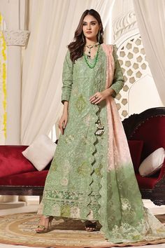 SHIRT STYLE: Long front open Shirt FABRIC: Slub Monarch Front fully embroidered, Embellished neckline of shirt with embroidered sleeves and back. Color: Olive Green TROUSER Straight Silk Trouser Color: Olive Green DUPATTA Embellished Dyed Burn out Dupatta Green Dupatta, Green Trousers